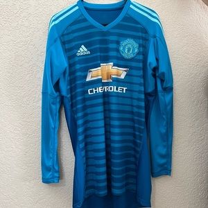 Manchester United team issue goalkeeper jersey.